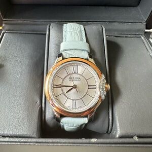 Bulova Silver and Gold Watch with Light Blue Strap